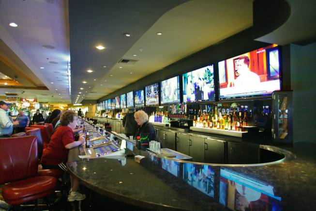 The Long Bar at The D Las Vegas Hotel and Casino, which caters to sports entusiasts wih its 15 mounted flat screen TVs Tuesday March 13, 2012.